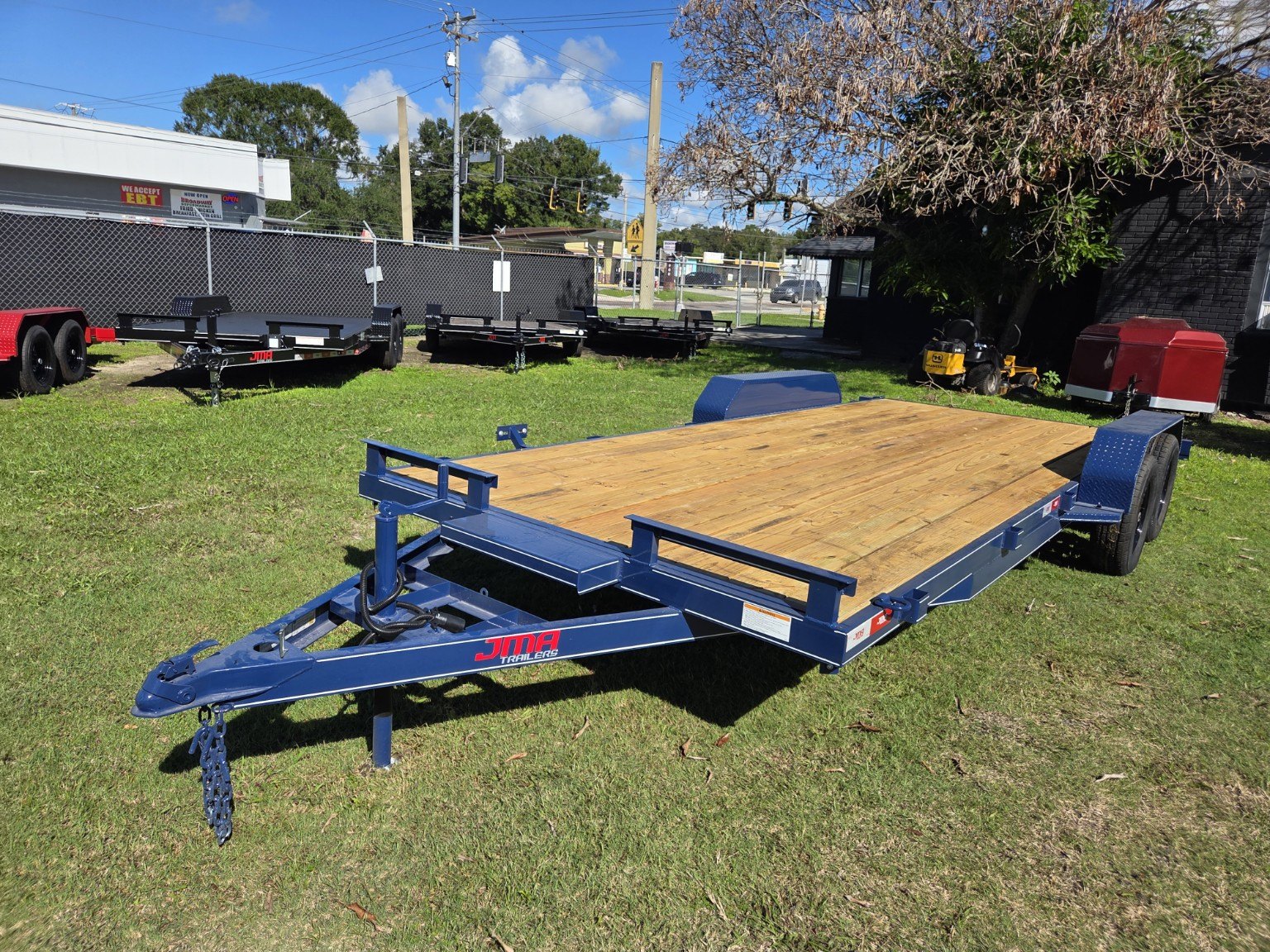 Blue wood deck trailer, front view