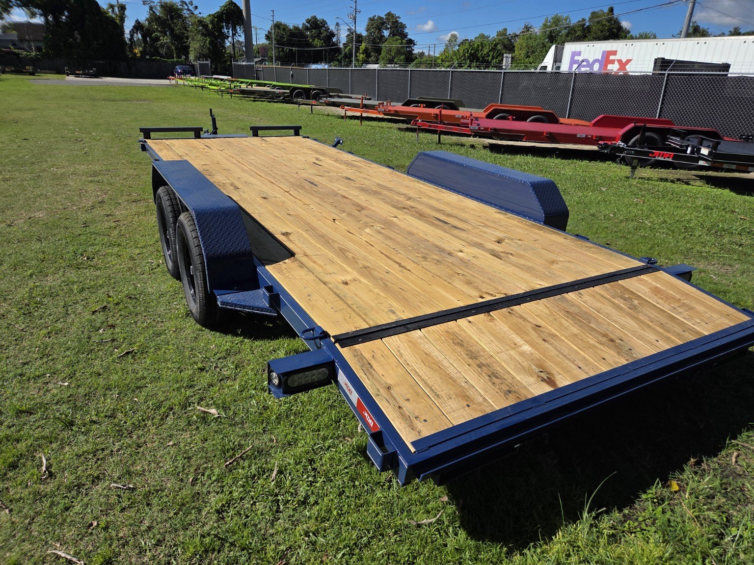 Blue wood deck trailer, rear view